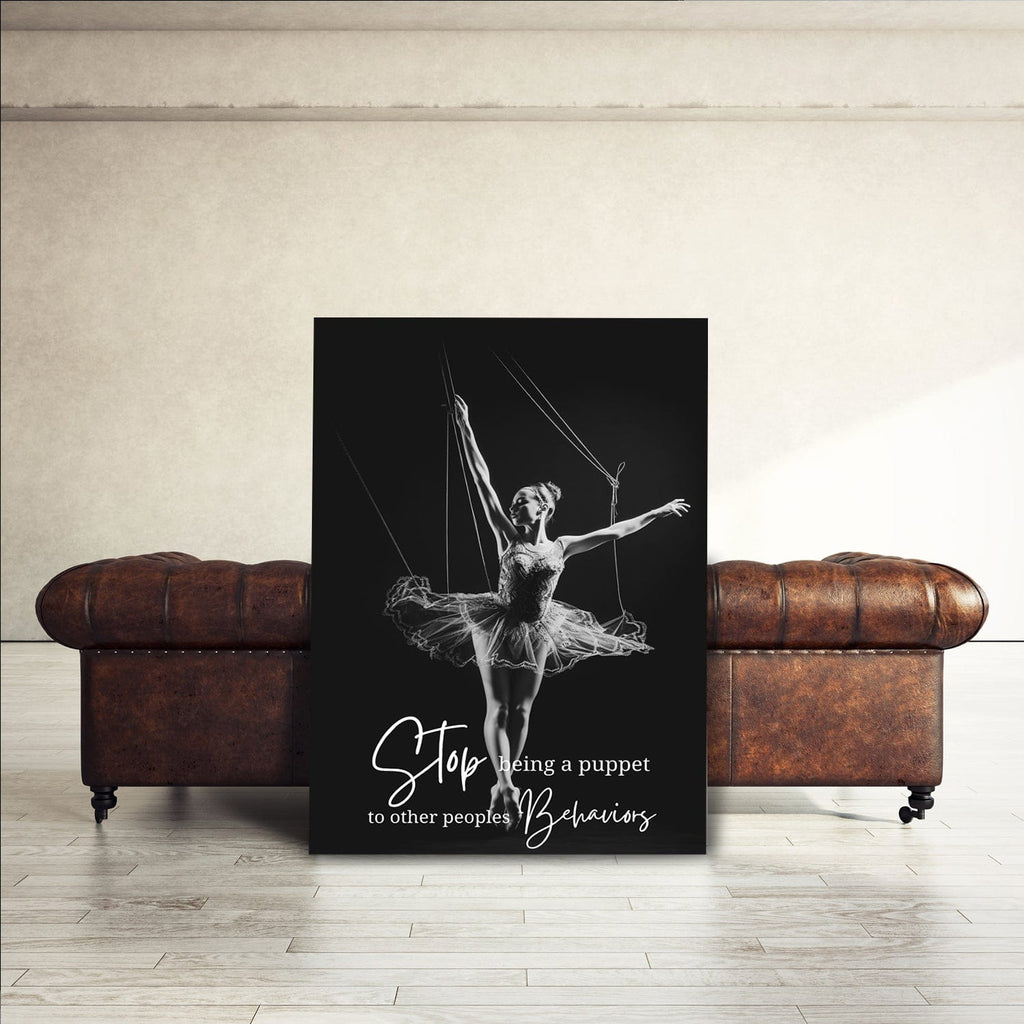 Black canvas wall art with ballerina in tutu and white 'Stop being a puppet' message.