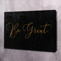 Black wall art canvas with gold cursive text 'Be Great'.