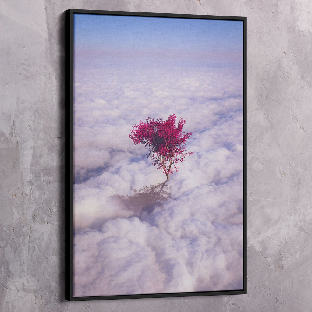 Motivational wall art canvas with black frame and pink tree over clouds