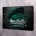 Black framed wall art with teal graffiti-style text and cat silhouette on brick background