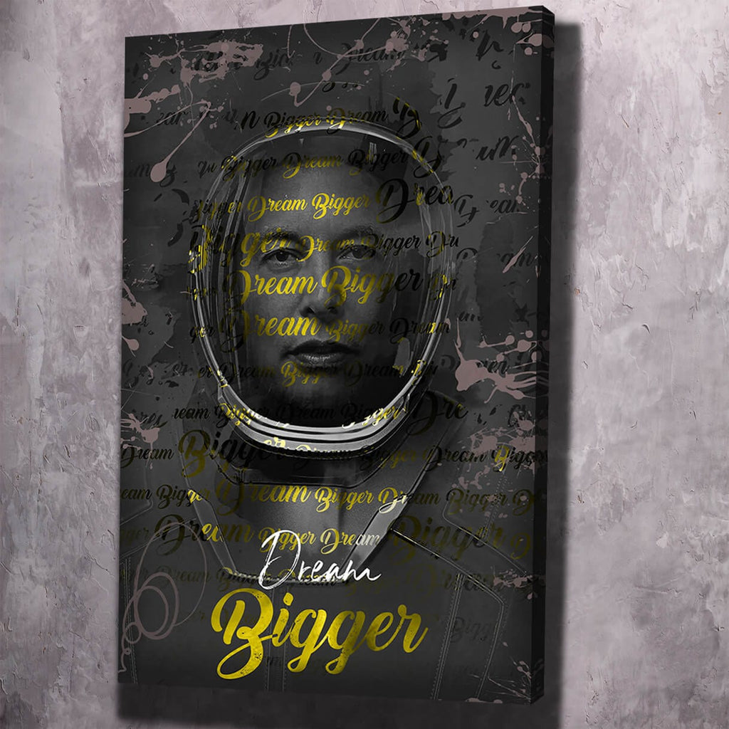 Wall art with glowing face outline and yellow “Dream Bigger” script on dark background
