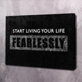 Black motivational wall art canvas with white text: START LIVING YOUR LIFE and FEARLESSLY