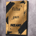 Gold and black motivational wall art canvas with 'Follow your DREAMS' text, portrait