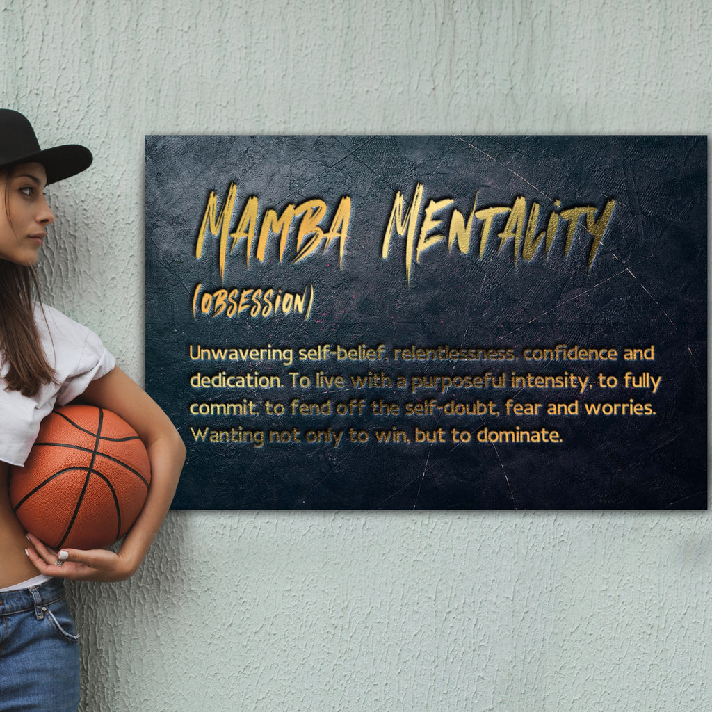 Dark blue wall art with yellow “Mamba Mentality” title and quote paragraph