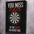 Motivational dartboard wall art on black canvas with red 100% text and quote